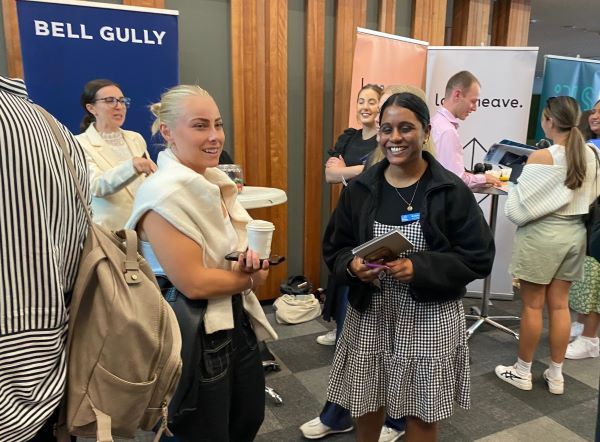 Student chatting to employer at AUT career expo