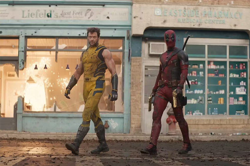 Promotional image of the movie, feturing the characters of Deadpool and Wolverine walking side by side.